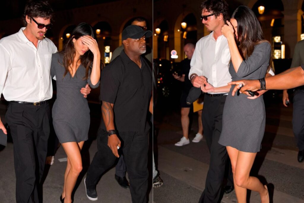 Kendall Jenner che mặt né tránh ống kính, còn Jacob đeo kính mát để bảo vệ mắt